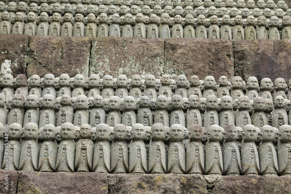 roll of Jizo Bodhisattva statues or statutes of baby buddha sat Hase-dera temple in Kamakura, Japan roll of Jizo Bodhisattva statues or statutes of baby buddha sat Hase-dera temple in Kamakura, Japan