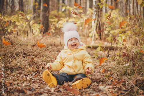 child funs in the woods. autumn park. The concept of fashion, accessories, outdoor walks
