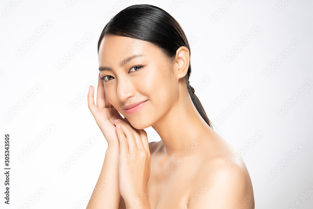 Beautiful young Asian woman touching soft cheek and smile with clean and fresh skin. Happiness and cheerful with, on white background, Beauty and Cosmetics Concept, Beautiful young Asian woman touching soft cheek and smile with clean and fresh skin. Happiness and cheerful with, on white background, Beauty and Cosmetics Concept,