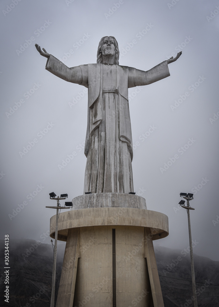 Lima, Peru - Nov 17, 2019: Cristo del Pacifico monument overlooks the city of Lima