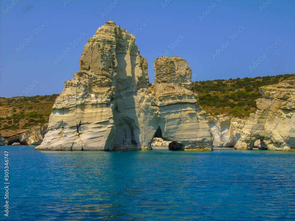 milos island in greece, kleftiko bay rock caves, sea swimming sailing in summer holidays