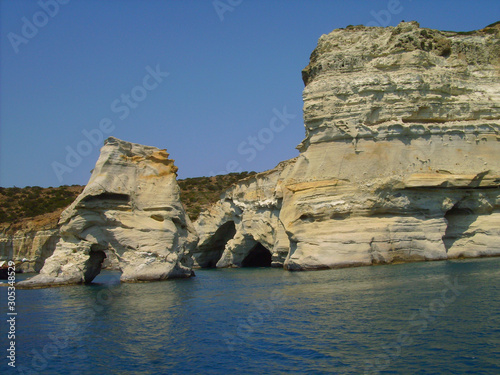 milos island in greece, kleftiko bay rock caves, sea swimming sailing in summer holidays