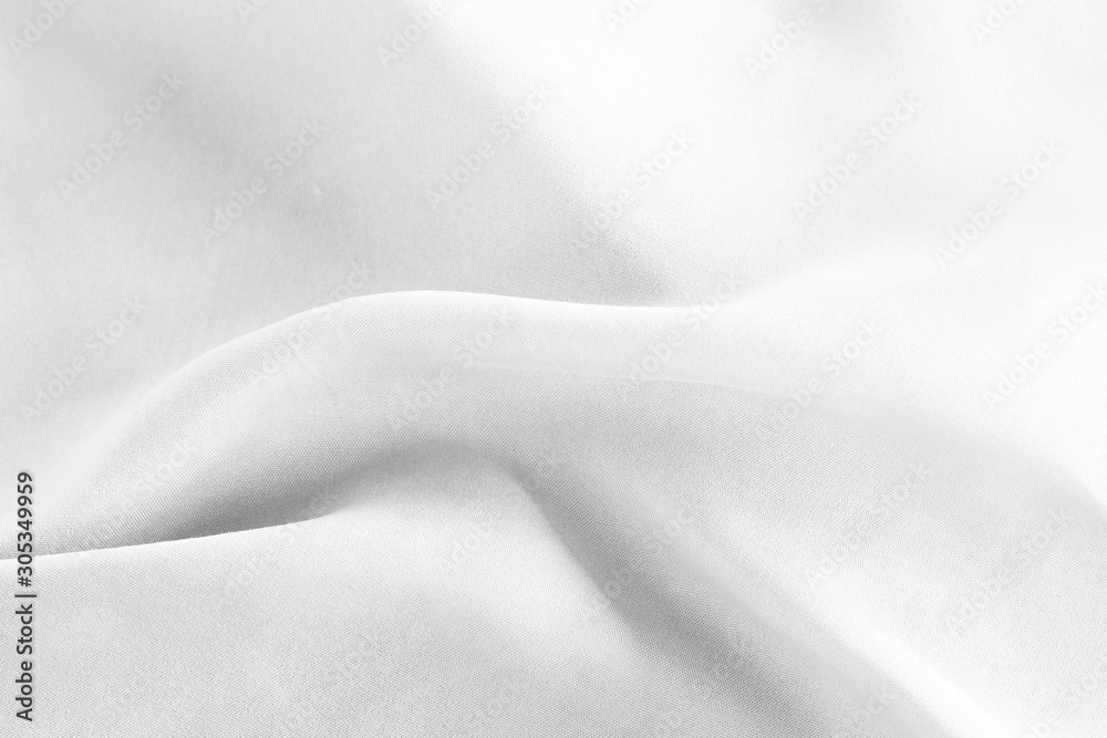 Closeup of rippled white silk fabric background Closeup of rippled white silk fabric background