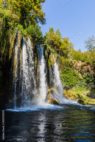 Bild auf Leinwand The upper Duden Waterfalls, a collection of small falls in a quiet municipal park in Antalya, Turkey
