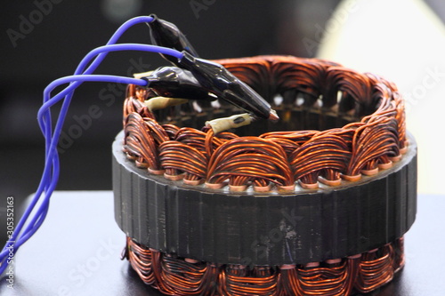 Tableau sur toile Car alternator repair, test of copper coil stator close up