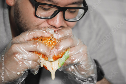 Man eats burger