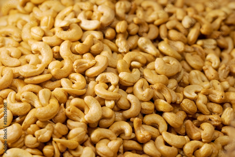 Close up pile of Roasted cashew nuts texture and background Close up pile of Roasted cashew nuts texture and background