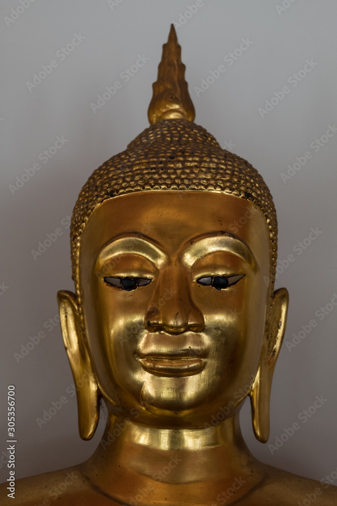 Great Buddha statue in typical Asian temple. Sacred religious figure