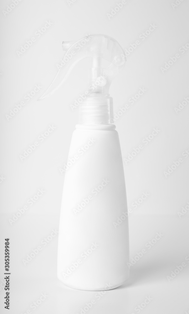 spray bottle on the table spray bottle on the table