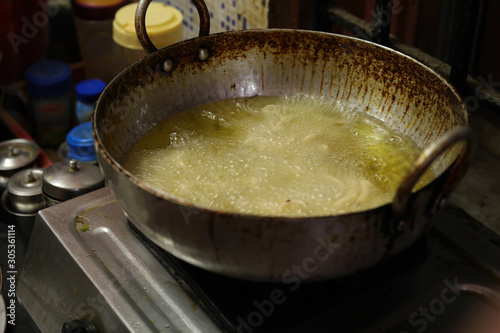 Prepare South Indian Homemade Muruk Diwali Festival Snacks in the Kitchen photo