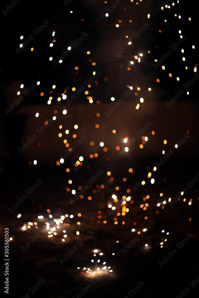 Fire crackers or fireworks in the sky. celebrating new year and Christmas and Diwali Fire crackers or fireworks in the sky. celebrating new year and Christmas and Diwali