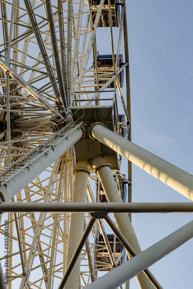 metal structure line of Ferris wheel close-up view of the bottom white colour