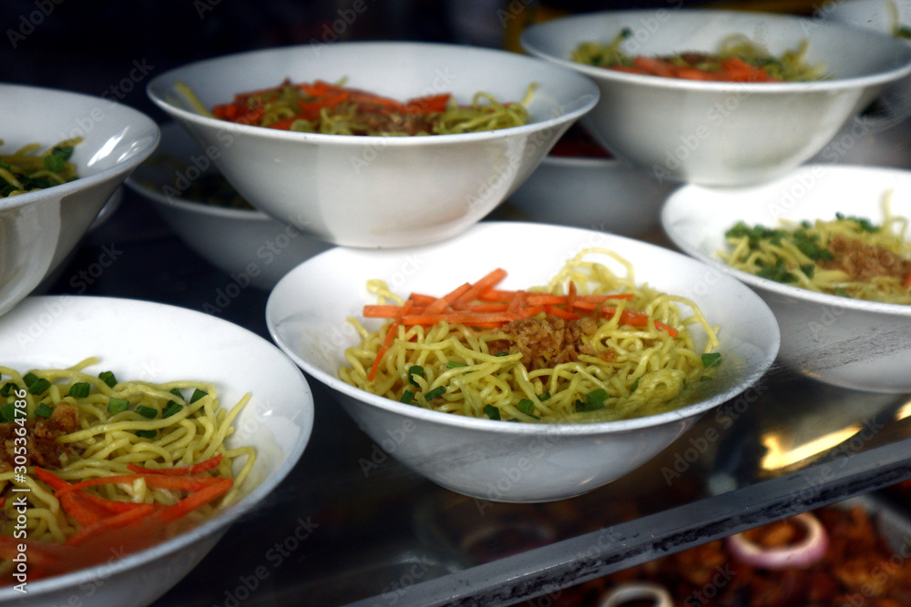 Prepared bowls of noodle soup on display Prepared bowls of noodle soup on display