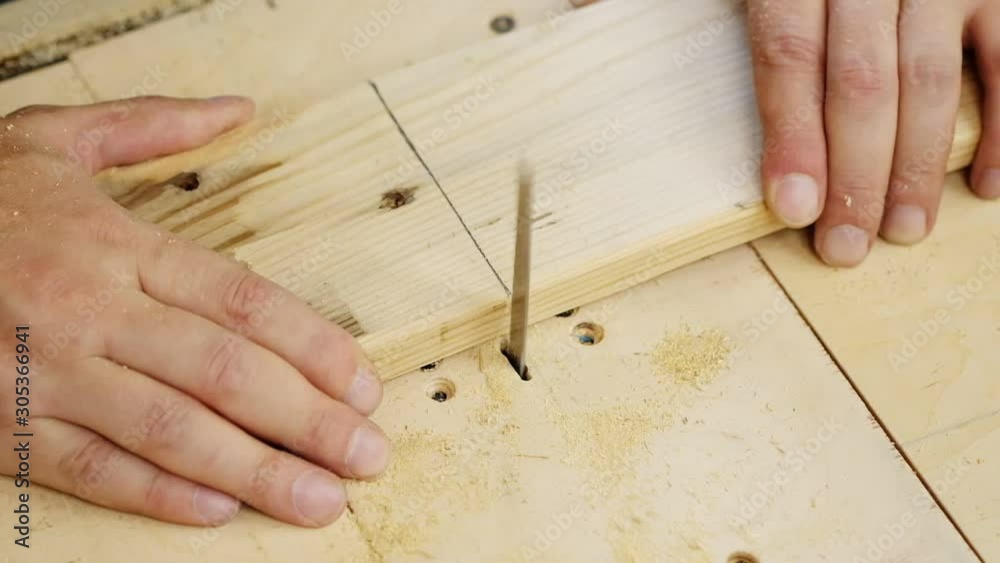 Carpenter cut wood with jig saw, workshop carpentry, hand. Carpenter cut wood with jig saw, workshop carpentry, hand.