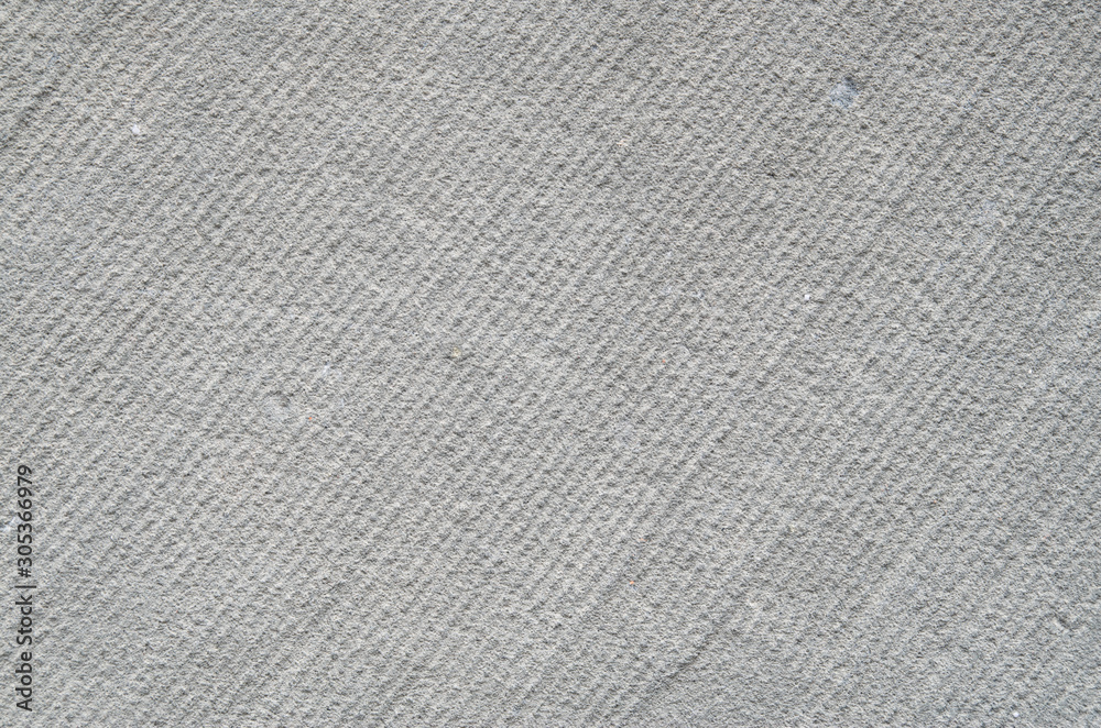 Processed sandstone with parallel lines closeup Processed sandstone with parallel lines closeup