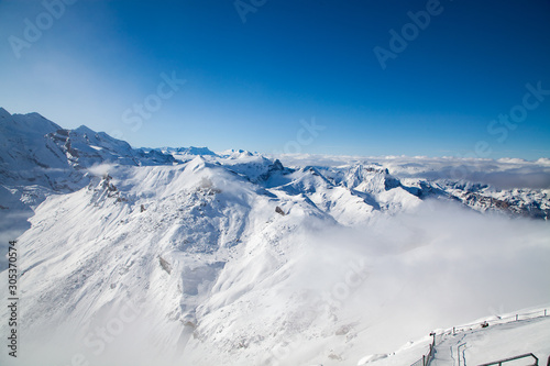 amazing snow covered peaks in the Swiss alps Jungfrau region from Schilthorn