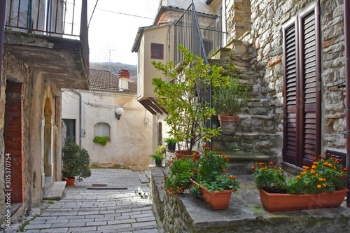 Civitanova del Sannio, 11/23/2019. A narrow street among the old houses of a mountain village in the Molise region © Giambattista