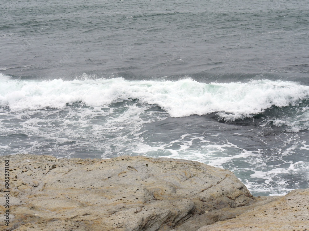 Waves breaking up on the rocks of a coastal area. Waves breaking up on the rocks of a coastal area.