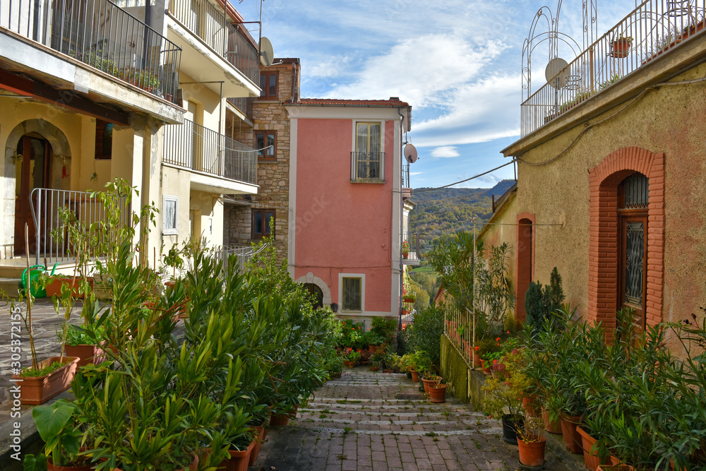 Civitanova del Sannio, 11/23/2019. A narrow street among the old houses of a mountain village in the Molise region