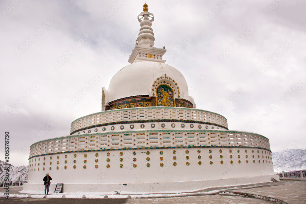Shanti Stupa on a hilltop in Chanspa for tibetan people and travelers foreigner travel visit and respect praying buddha at Leh Ladakh in Jammu and Kashmir, India