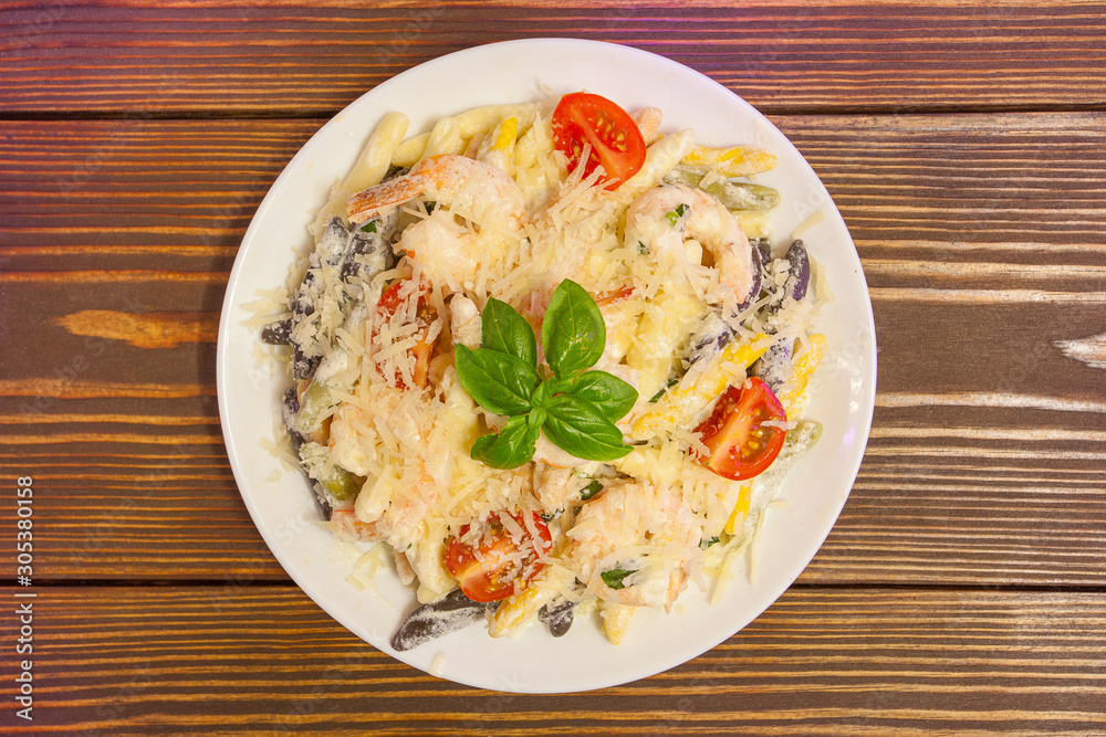delicious gigli t with shrimps and basil on plate delicious gigli t with shrimps and basil on plate