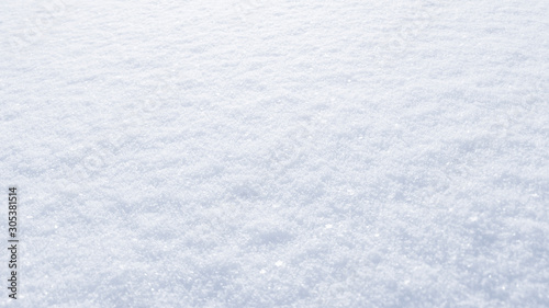 Winter snow background. The texture of fresh, clean, sparkling, freshly fallen snow