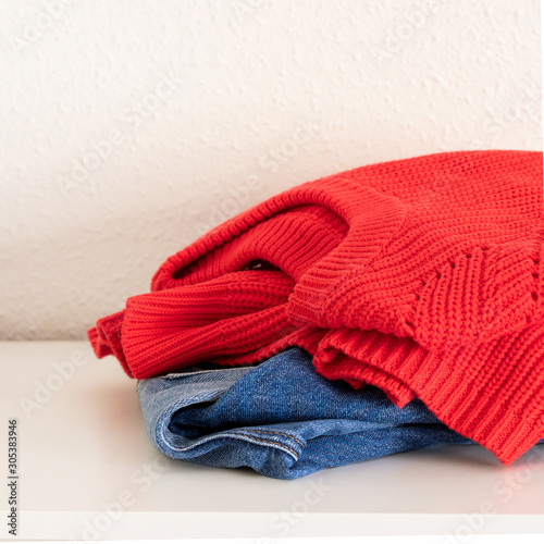 Blue jeans, red knitted sweater ,
