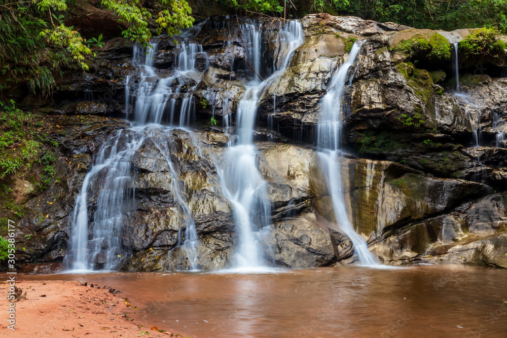 Fototapeta premium Waterfall in forest at Amboro national parc. Bolivia.