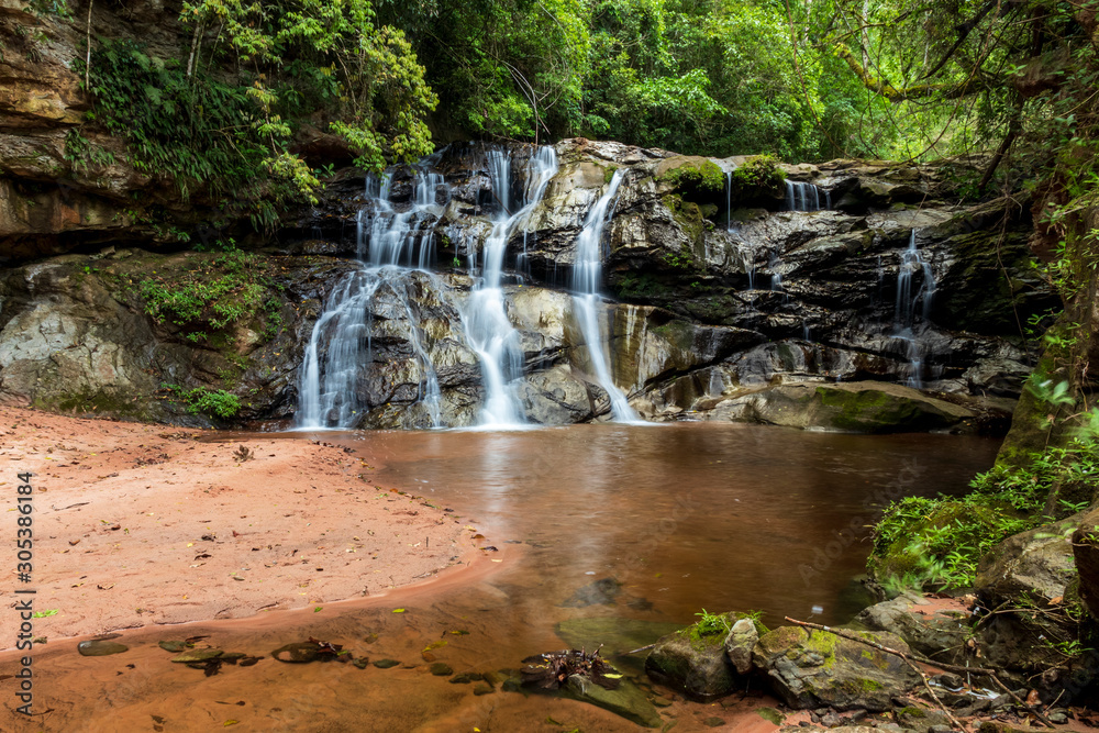 Obraz premium Waterfall in forest at Amboro national parc. Bolivia.