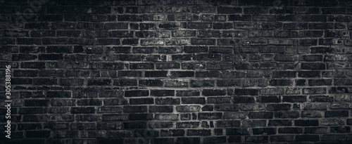 Rough black brick wall texture background