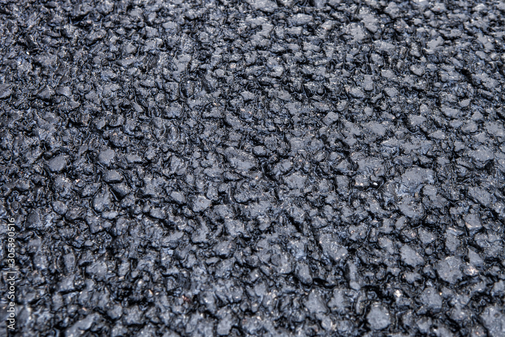 Embossed texture of the new pavement. Coarse asphalt. Embossed texture of the new pavement. Coarse asphalt.