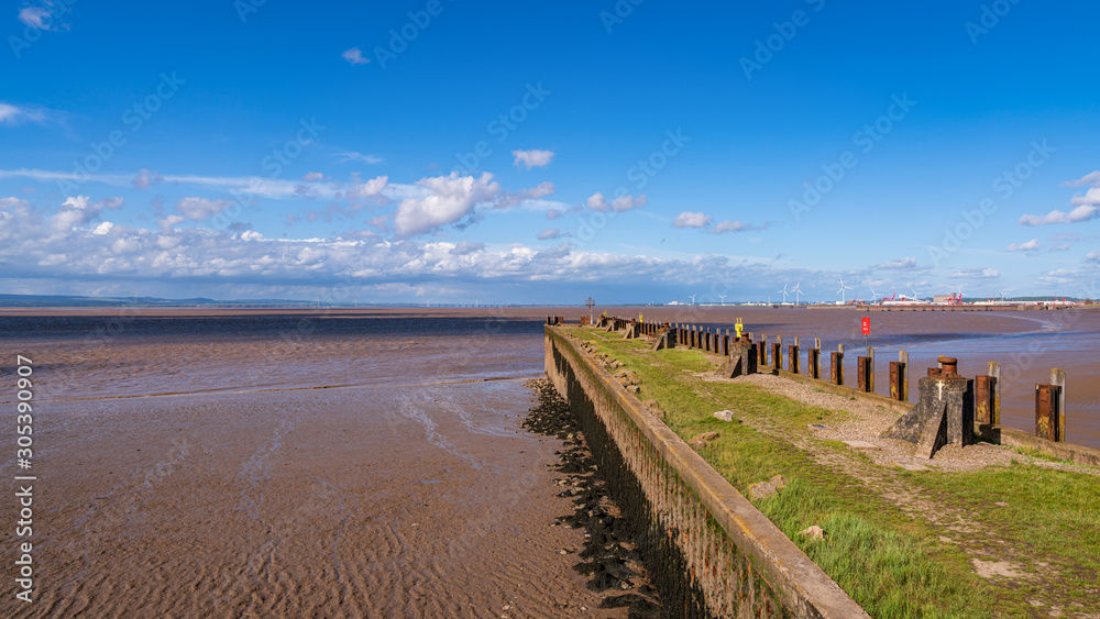 Low tide at the Portishead Pier with the Bristol Channel in the background, seen in Portishead, North Somerset, England, UK