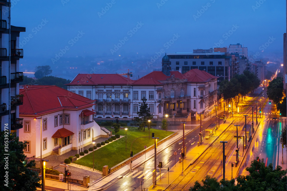 Aerial view of historical buildings in Gaia, Portugal at sunrise