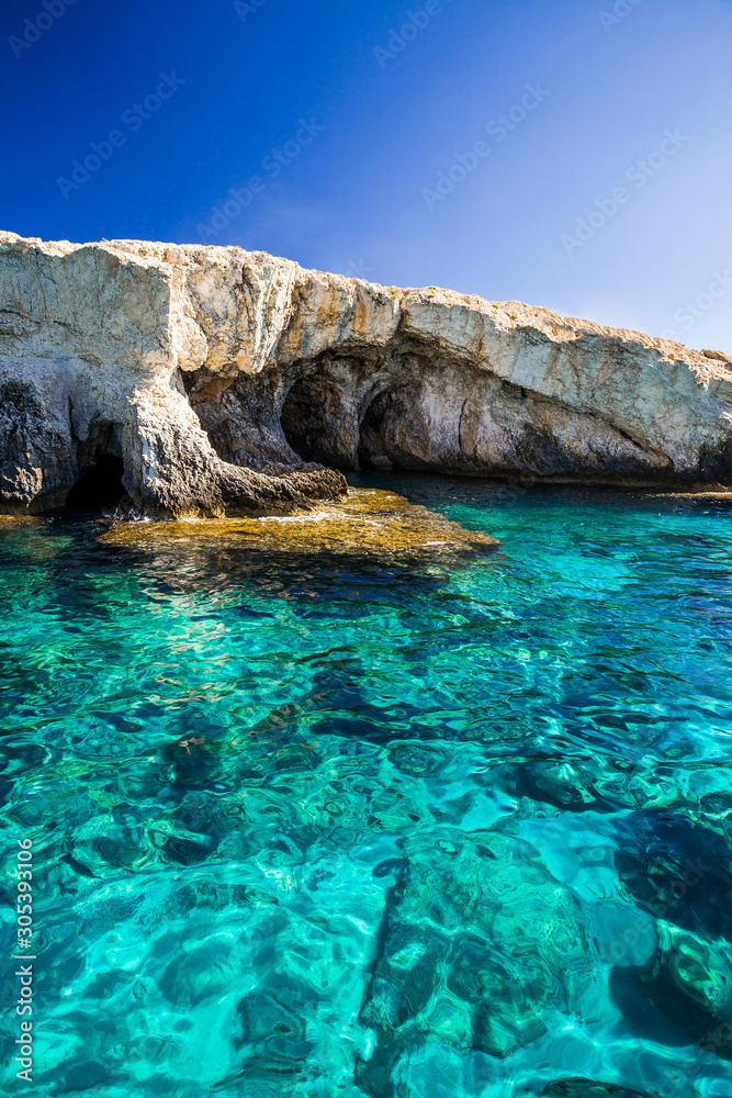 Rocky sea shore and turquoise clear water. Ayia Napa, Cyprus.