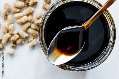 Turkish Mulberry Confiture Molasses Pekmez and Mulberries. photo