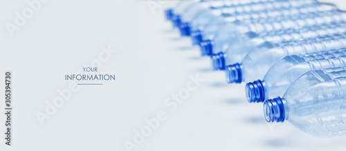 Empty blue plastic bottles stacked in a line. Waste recycle concept. Manufacturing process.  Web article template. Long header banner format. Sale coupon. Visit card. Your information. Text space.
