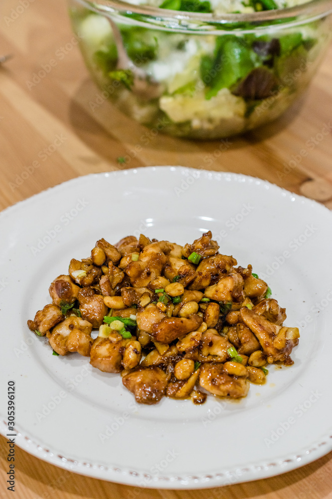 Homemade Kung Pao Chicken with Peanuts, Peppers, Soy Sauce, Green Chives and Veggies. Homemade Kung Pao Chicken with Peanuts, Peppers, Soy Sauce, Green Chives and Veggies.