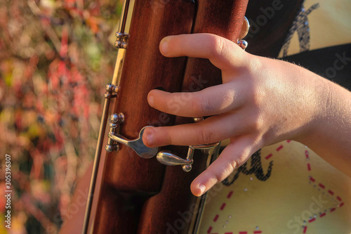 Photography Baby fingers on bassoon buttons