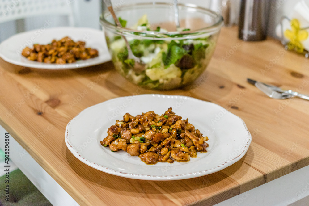 Homemade Kung Pao Chicken with Peanuts, Peppers, Soy Sauce, Green Chives and Veggies. Homemade Kung Pao Chicken with Peanuts, Peppers, Soy Sauce, Green Chives and Veggies.