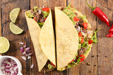 tacos with beef, avocado and tomato- tortilla bread