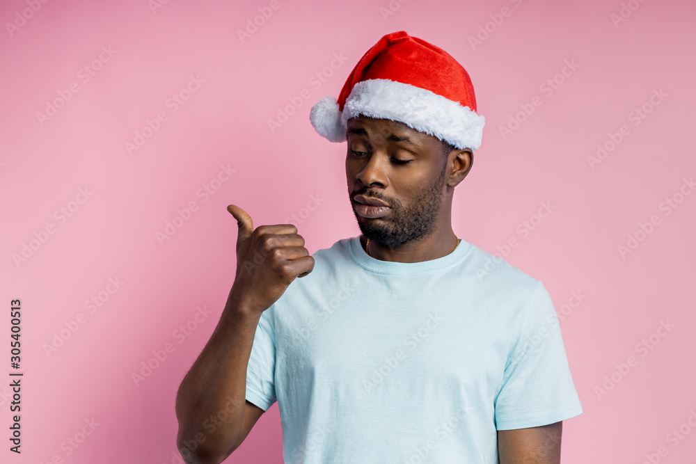 African american man wearing Santa hat