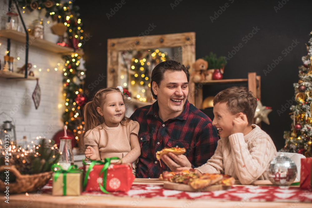 funny kids with dad eating pizza