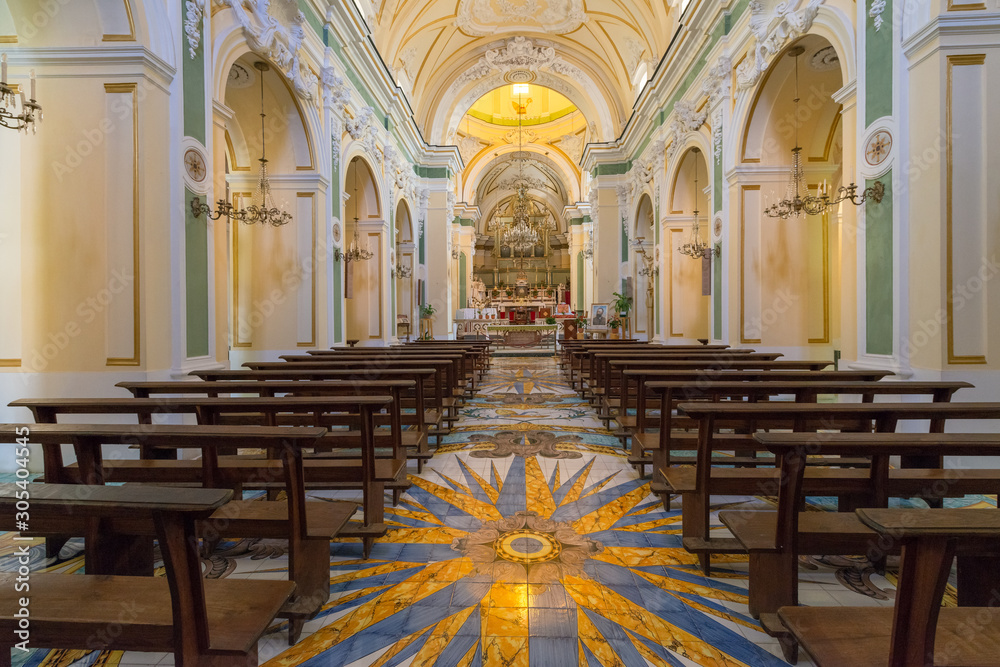 Obraz premium NAPLES, ITALY - 10.05.2018: Interiors and details of the Duomo, cathedral of Praiano church, Amalfi Coast. Built for saint Januarius, Campania, Italy in summer.