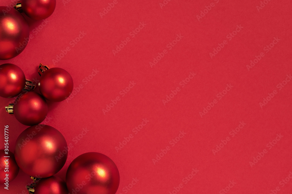 Christmas or New Year Festive red background with Christmas balls Christmas or New Year Festive red background with Christmas balls