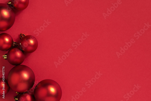 Christmas or New Year Festive red background with Christmas balls