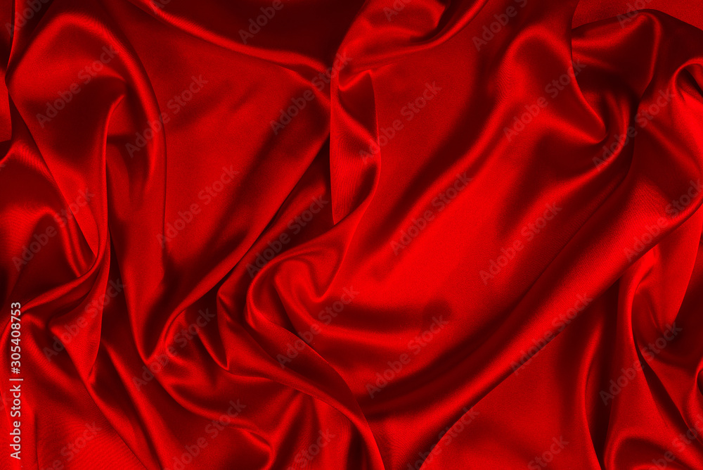 Red silk or satin luxury fabric texture can use as abstract background. Top view. Red silk or satin luxury fabric texture can use as abstract background. Top view.
