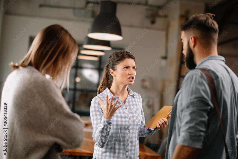 Colleagues arguing in office. Problem in team. Business people at meeting. Colleagues arguing in office. Problem in team. Business people at meeting.