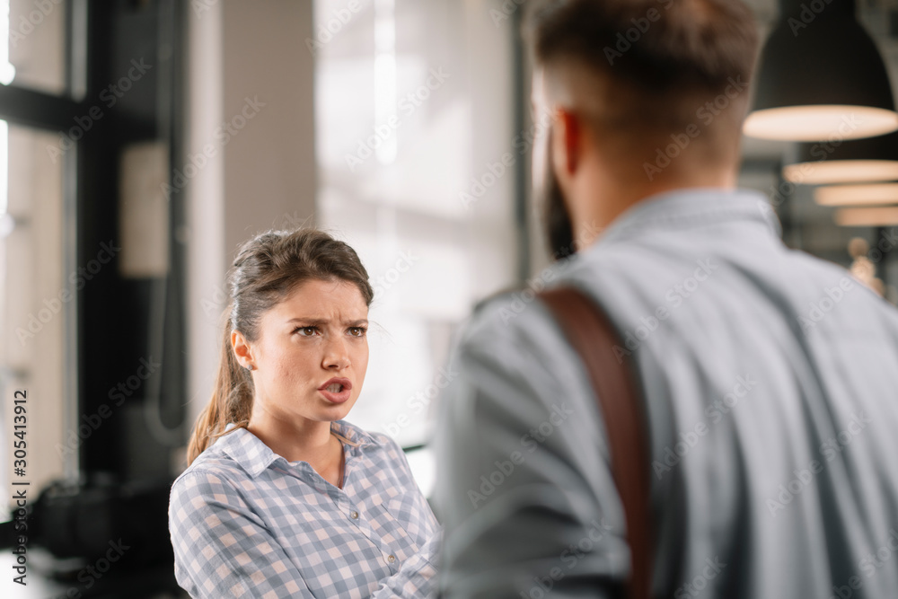 Colleagues arguing in office. Problem in team. Business people at meeting. Colleagues arguing in office. Problem in team. Business people at meeting.