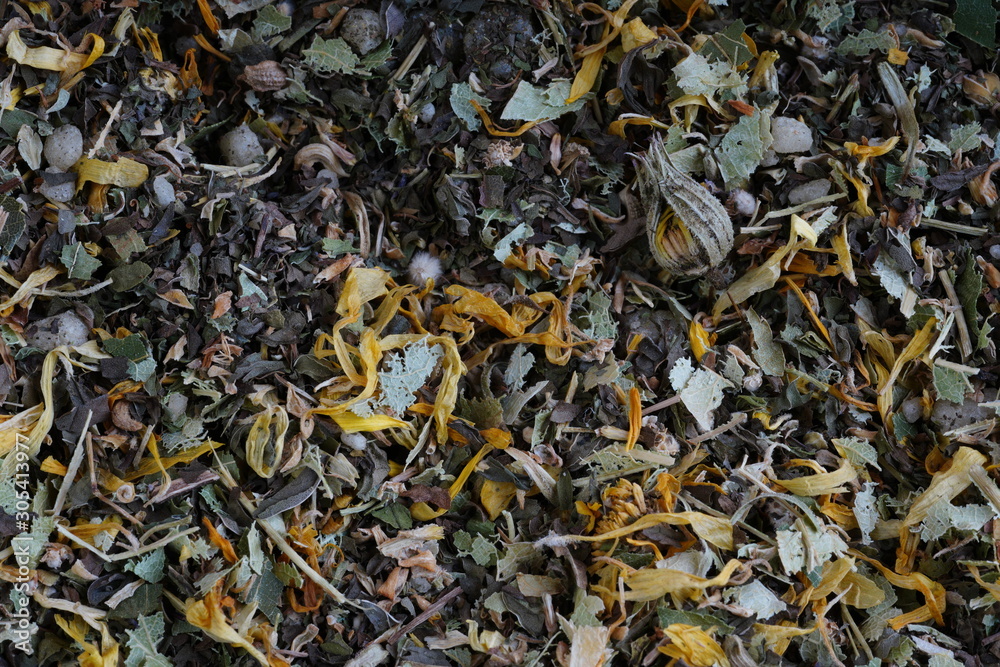 Background, texture of dried tea leaves. Macro texture background of dried, raw white tea leaves frame filling flat lay from above. Background, texture of dried tea leaves. Macro texture background of dried, raw white tea leaves frame filling flat lay from above.
