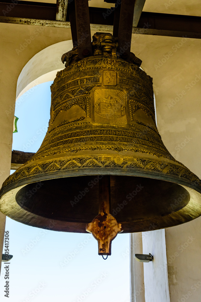 Big bell on the bell tower of church Stock Photo